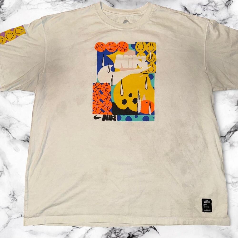 Cream nike graphic tee